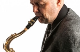 Adult Man Playing Saxophone for Music Lessons in Toronto