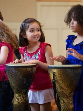 Girls Playing Drums in Rhythm Kids Class