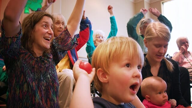 Babies, Toddlers, Adults and Seniors making music and playing together