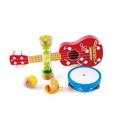 Red ukulele, blue tambourines, and hand percussion instrument.